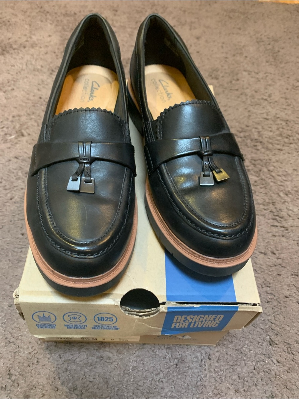 Clarks Black Leather Tassel Penny Loafers with Brown Trim